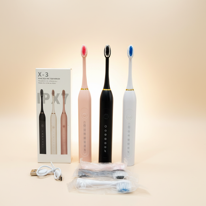 X-3 sonic electric toothbrushes in black, pink and white with accessories