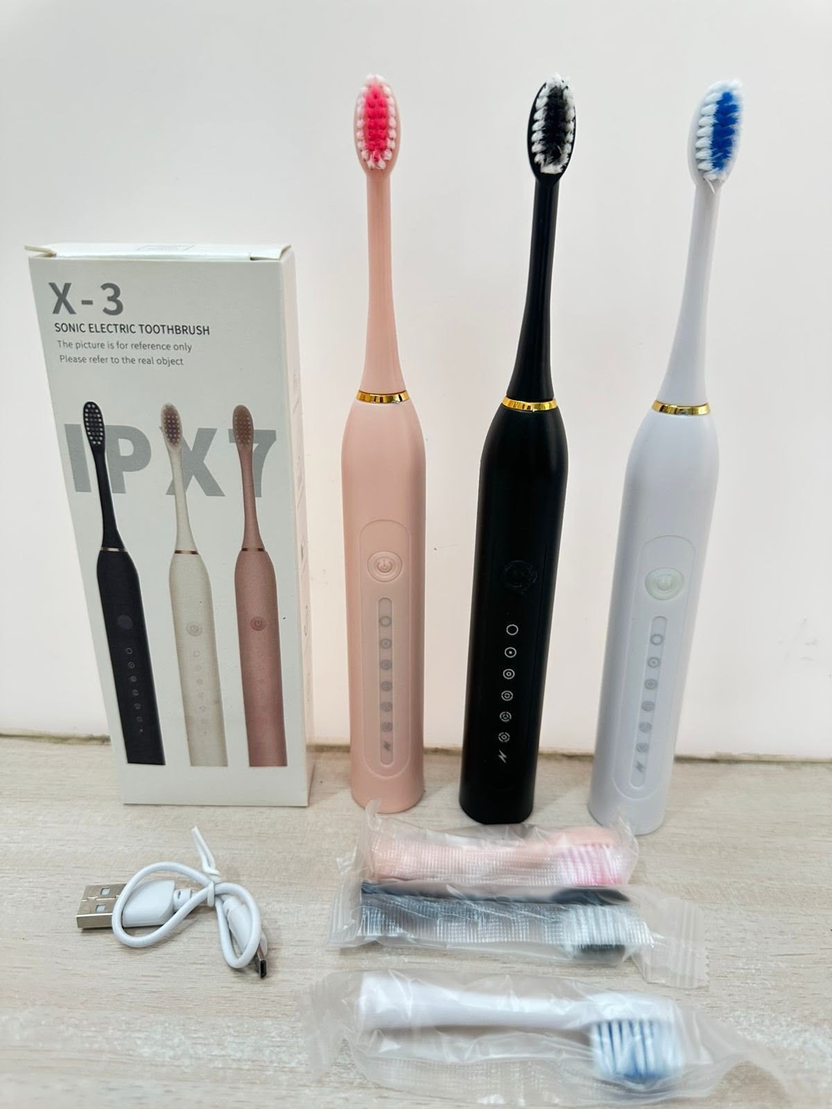 X-3 electric toothbrushes with box, replacement heads and USB cable